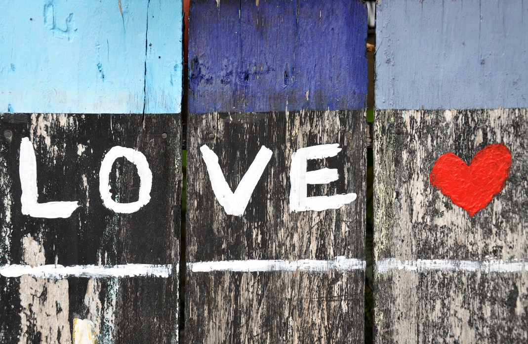 Love written on a fence